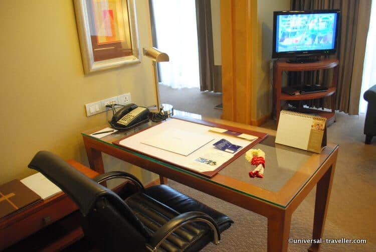 A Desk With A Range Of Useful Utensils.