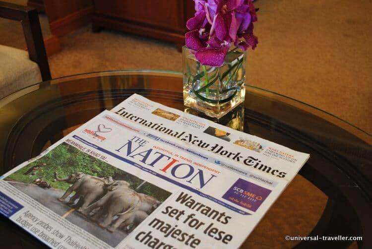 The Latest Newspaper With Beautiful Orchid Flowers.