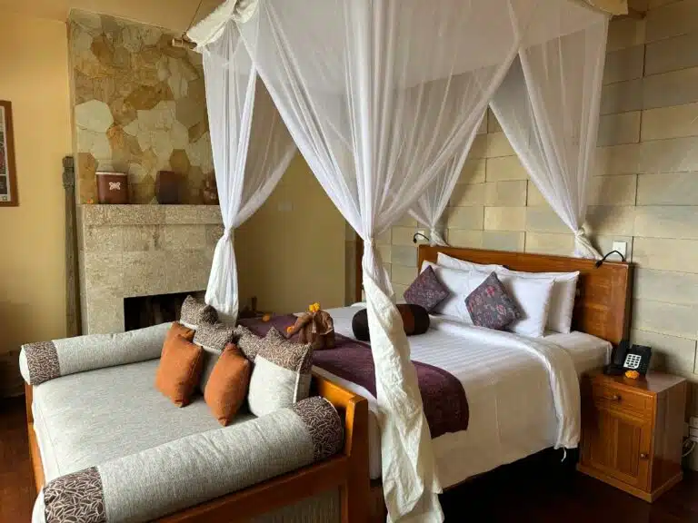 A Bed With A Canopy Over It